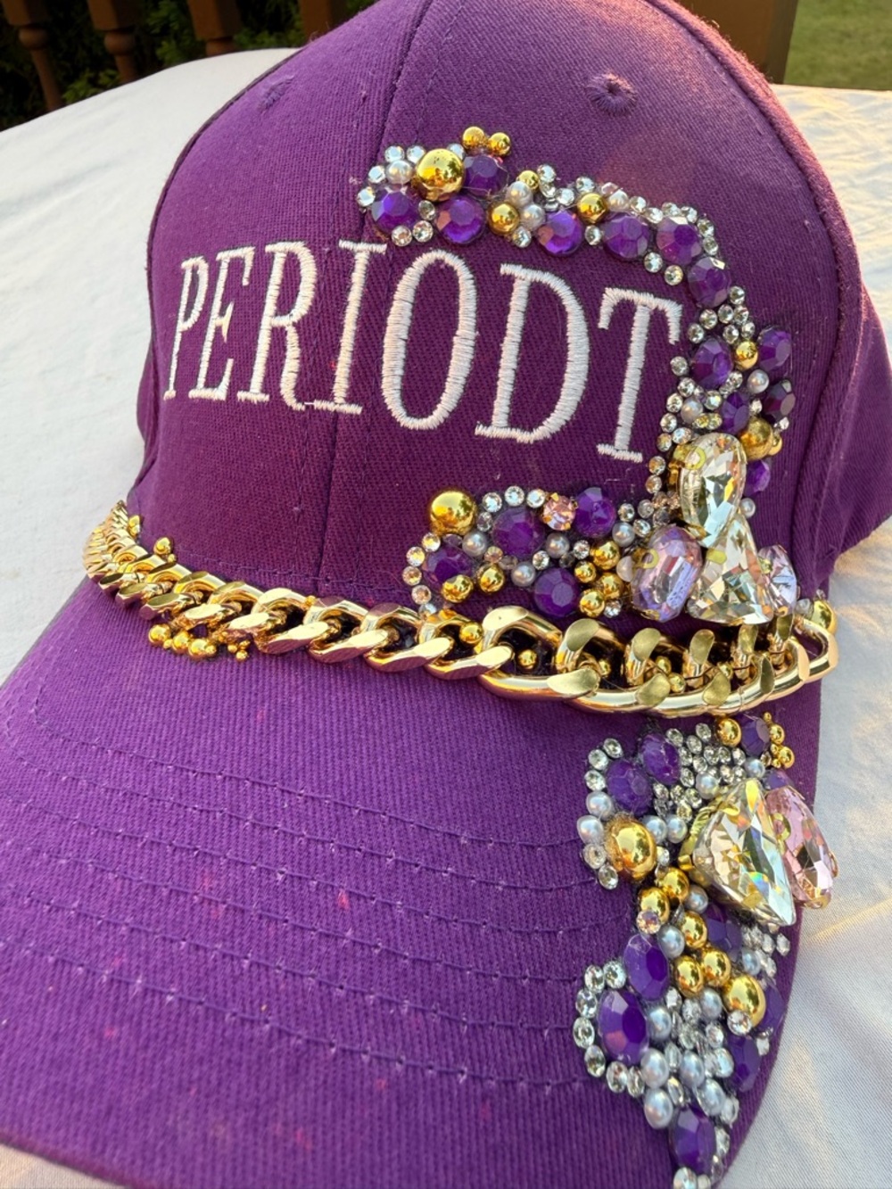 PERIODT Embellished Purple Baseball Cap with Gold Chain